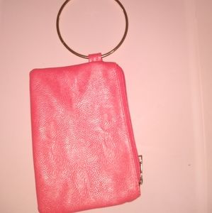 Coral wristlet with metal circle loop handle